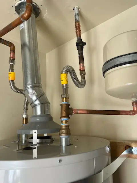 Water heater installation and plumbing repair in Marceline